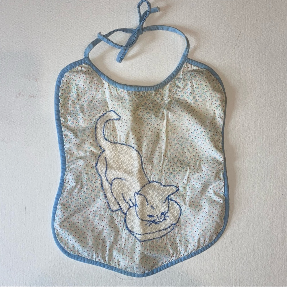 Vintage baby bib with embroidered cat